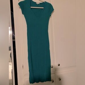 Green form fitting dress